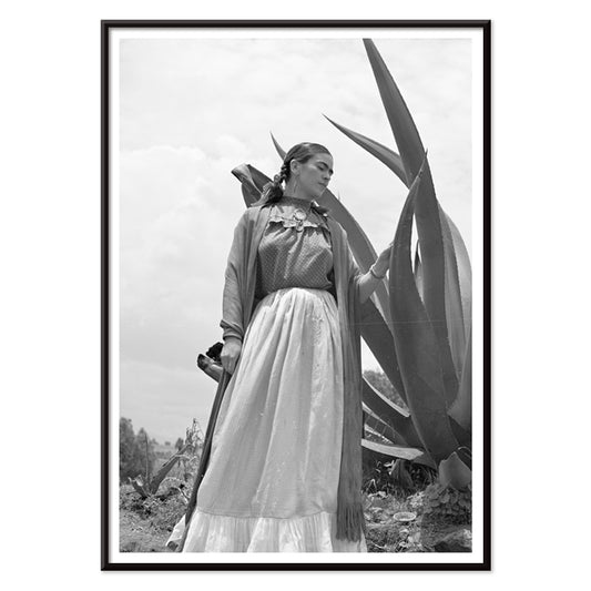 Frida Kahlo standing by agave plant black and white photograph and poster by Toni Frissell titled Senora Diego Rivera, with black aluminium frame on white background