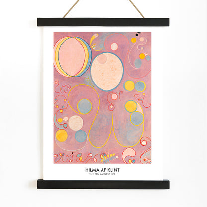 Abstract colorful swirls and pastel shapes on pink background painting and poster from The Ten Largest Adulthood by Hilma AF Klint, with wooden magnetic frame on white background