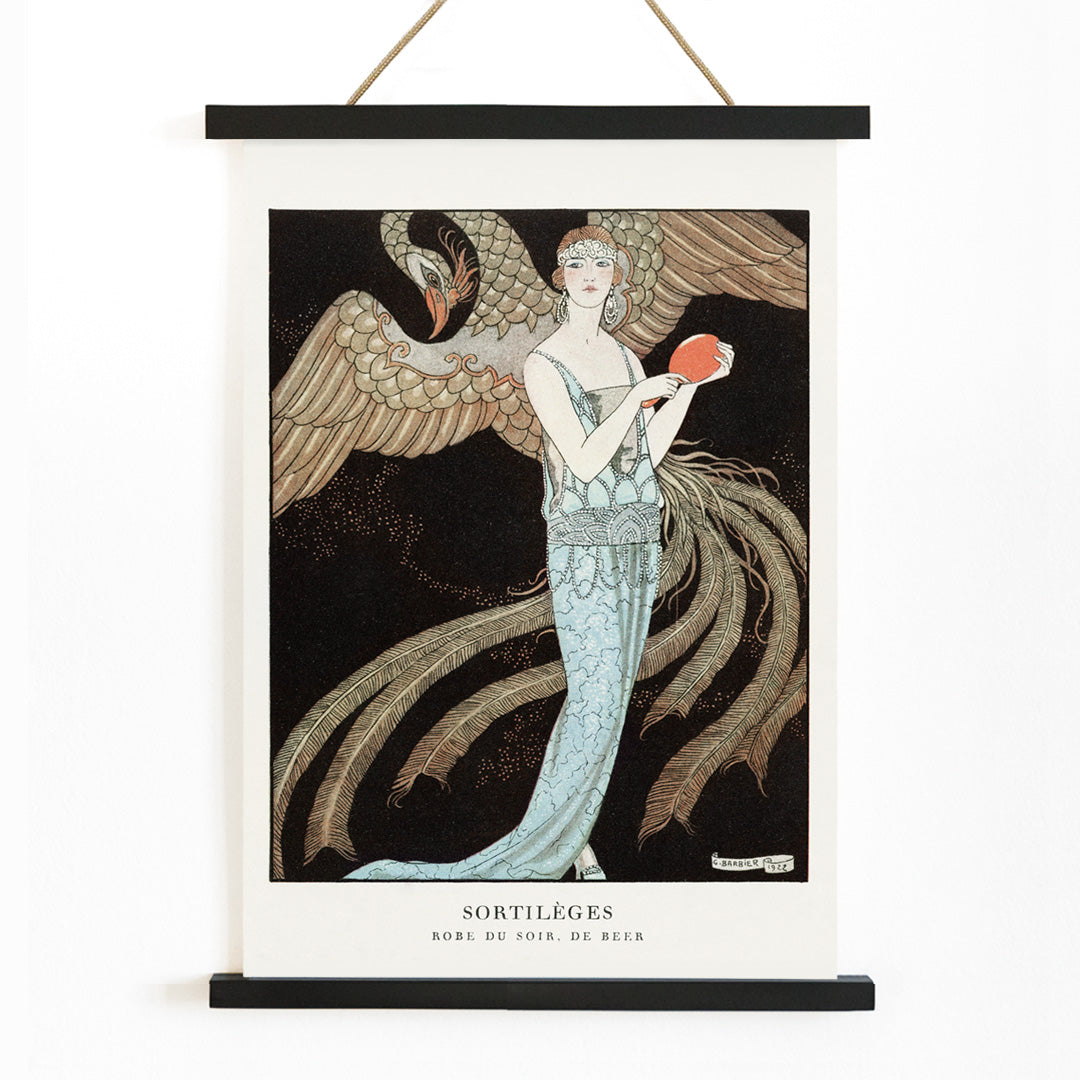 Elegant woman in blue evening dress with majestic bird Sortileges Evening dress by George Barbier art deco poster, with wooden magnetic frame on white background