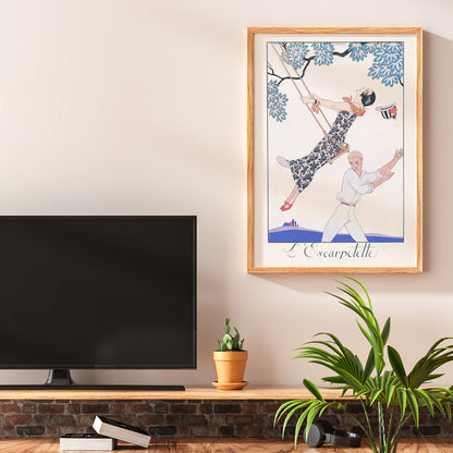 Art Deco poster of a woman on a swing with a man beneath under a tree from LEscarpotette by George Barbier, framed and displayed in home decor
