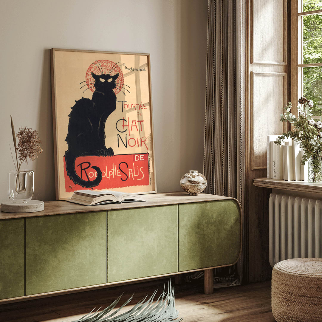 Black cat poster with bold red and yellow accents Tournee du Chat Noir artwork by Theophile Alexandre Steinlen, framed and displayed in home decor