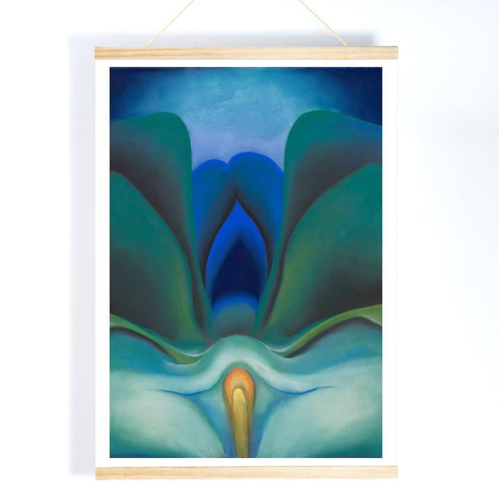Georgia OKeeffe Blue Flower poster luminous blue and green abstract bloom with soft yellow center, with wooden magnetic frame on white background