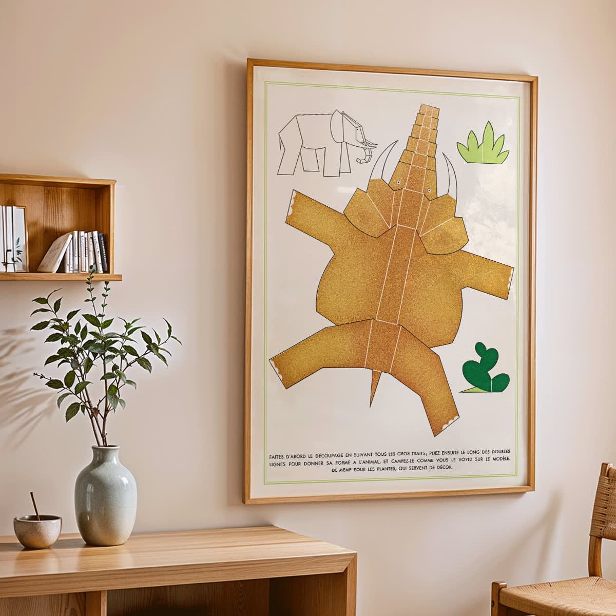 Collage and poster of geometric cutout animals and plants by Turenne Chevallereau La Jungle chez moi Pl 02, framed and displayed in home decor