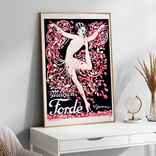 Art Deco poster of Marion Forde by Charles Gesmar featuring a dancer in a pink dress surrounded by vibrant swirling petals, framed and displayed in home decor