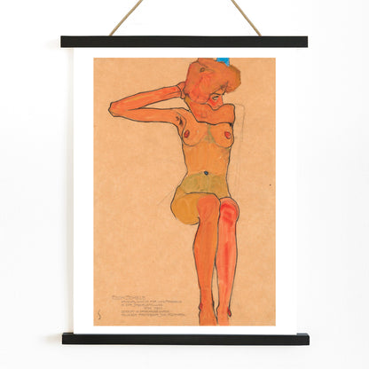 Seated female nude in expressive style Mädchenakt Gertrude by Egon Schiele poster featuring a nude figure in a seated pose with expressive lines and color, with wooden magnetic frame on white background