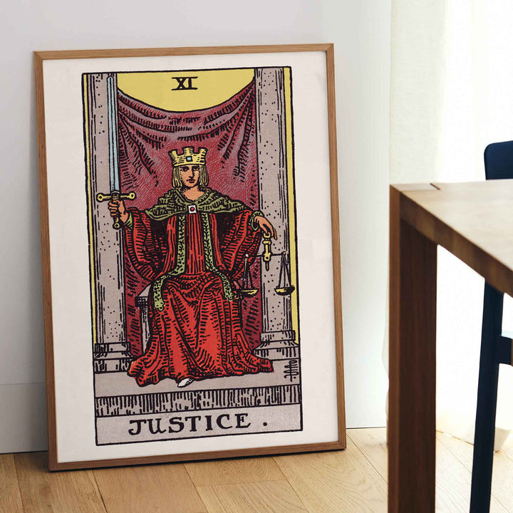 Pamela Colman Smith Justice tarot poster crowned figure in red robes with scales and sword, framed and displayed in modern living room decor