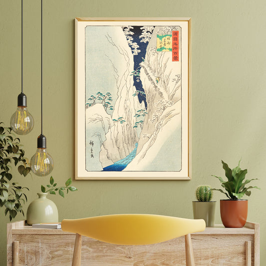Snowy mountain gorge with river travelers and trees in The Kiso Gorge in Snow Shinano Province by Hiroshige II Japanese artwork poster, framed and displayed in home decor