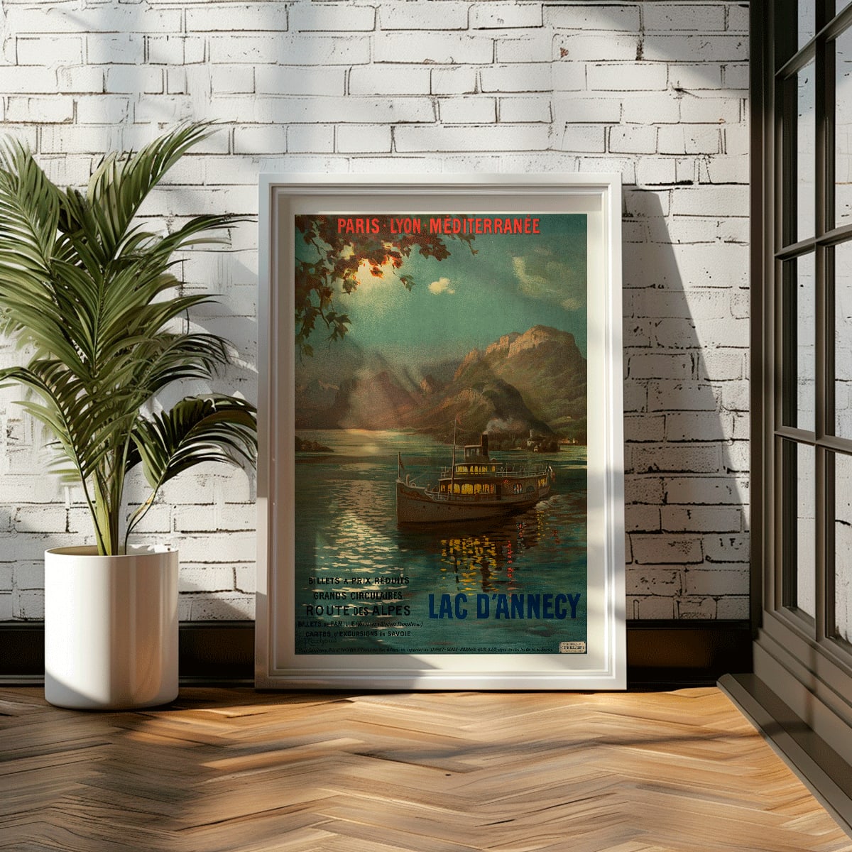 Poster of Lac d Annecy by Francois Charles Cachoud showing a boat on a serene lake with mountains and a glowing evening sky, framed and displayed in modern living room decor