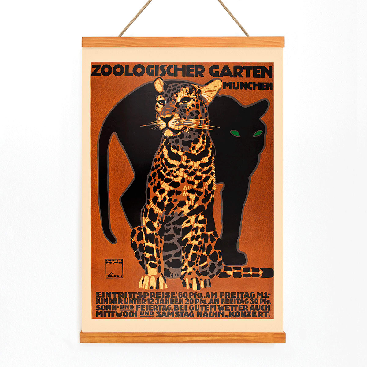 Leopard and black panther poster for Zoologischer Garten München by Ludwig Hohlwein featuring bold text artwork, with wooden magnetic frame on white background
