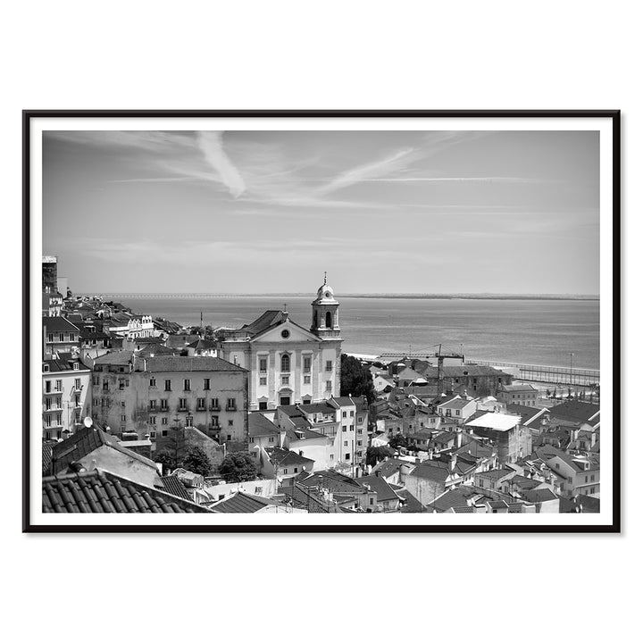 Lisbon Old City Landscape Black and White Picture 1 showing historic buildings rooftops and ocean view waterfront poster, with black aluminium frame on white background