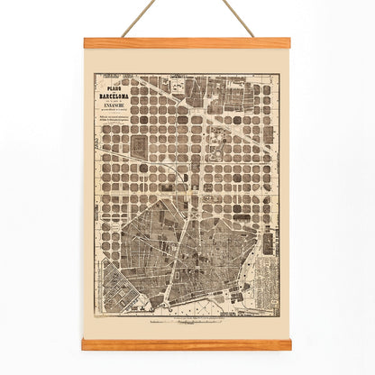 Detailed vintage map of Barcelona poster artwork featuring a city map layout with illustrated streets and blocks, with wooden magnetic frame on white background