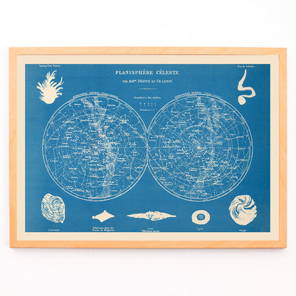 Celestial planisphere star map poster by Claude Joseph Drioux featuring constellations and astronomical illustrations on blue background, framed and displayed in modern living room decor