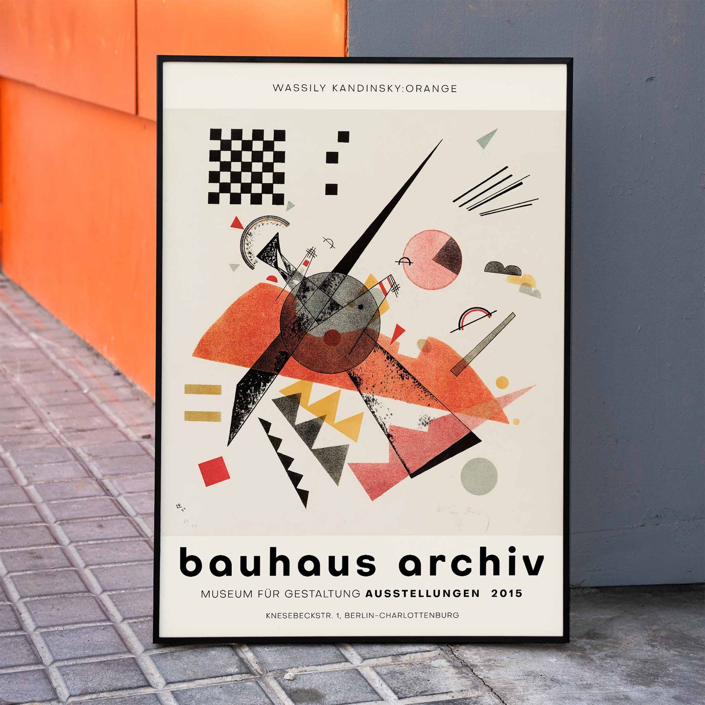 Abstract artwork Orange Bauhaus exhibition poster by Wassily Kandinsky featuring abstract geometric shapes in various colors, framed and displayed in home decor