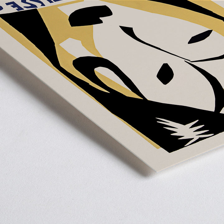 Closeup detail of Henri Matisse Maison de la Pensee francaise poster with bold black abstract face shapes on warm yellow and cream minimalist design