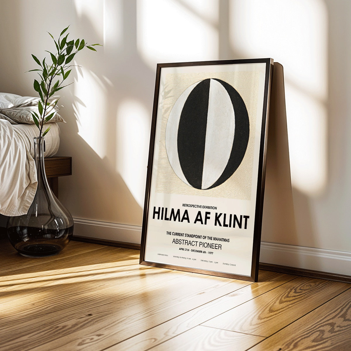 Abstract artwork The Current Standpoint of the Mahatmas by Hilma Af Klint featuring geometric shapes and a black and white abstract circular design poster, framed and displayed in modern living room decor