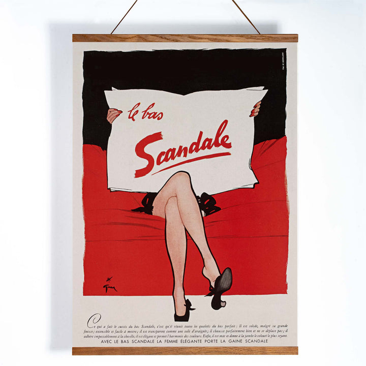 Paul Iribe Le bas scandale poster with crossed legs white sign and bold red black vintage advertising design, with wooden magnetic frame on white background