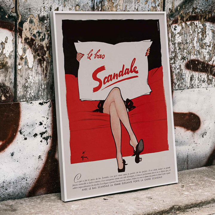 Paul Iribe Le bas scandale poster with crossed legs white sign and bold red black vintage advertising design, framed and displayed in modern living room decor