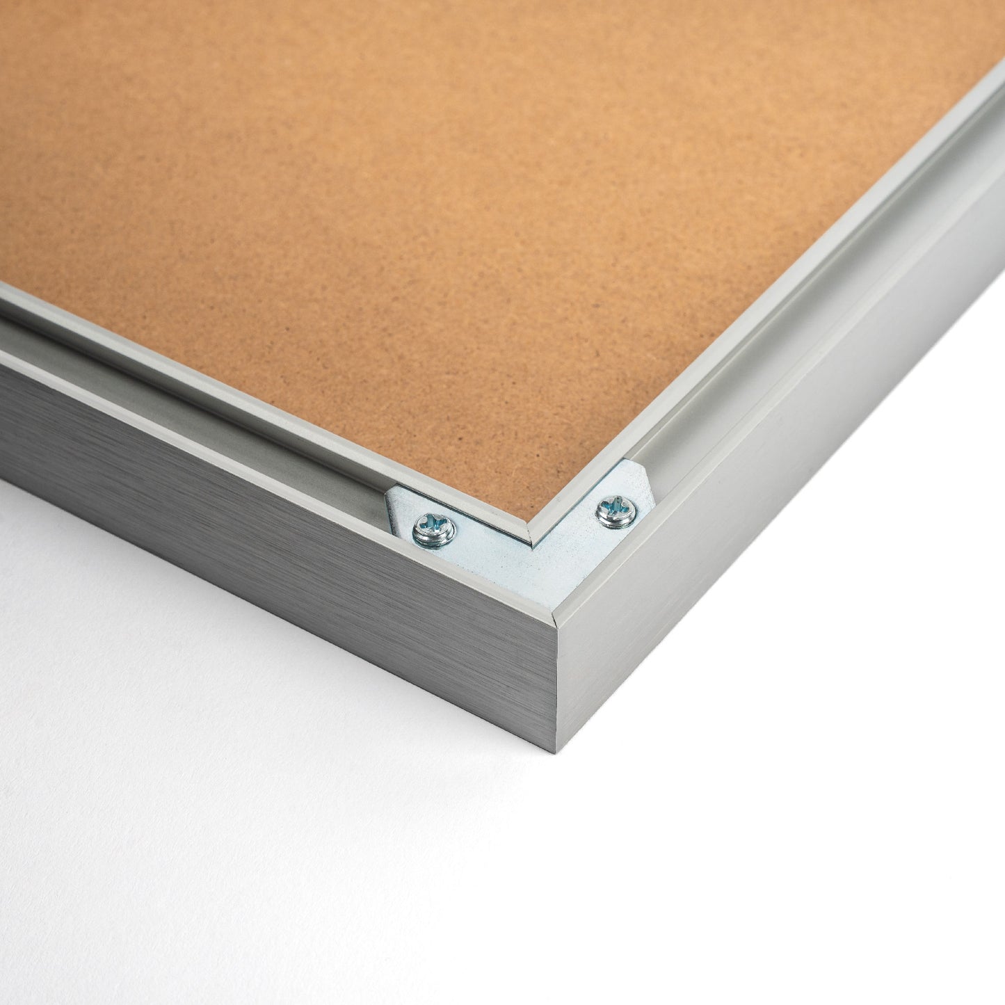 Silver aluminium picture frame with clean lines and a subtle metallic finish, suitable for displaying photos or artwork in a modern interior., back corner closeup picture