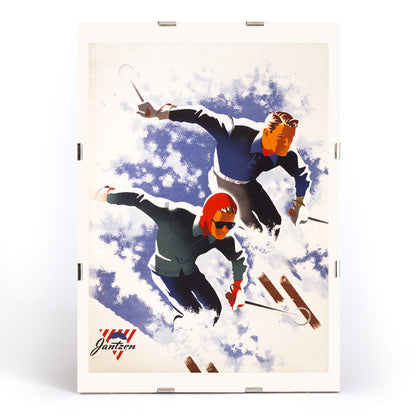 Poster of man and woman skiing down snowy slope artwork by Joseph Binder, framed and displayed in modern living room decor