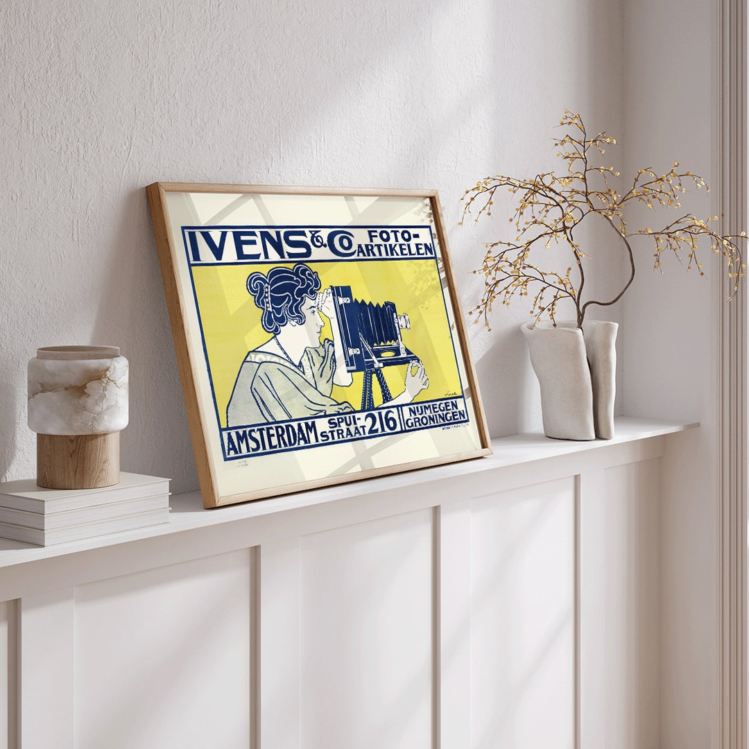 Art nouveau poster of woman using vintage camera at Ivens and Co Camera Shop by Johann Georg van Caspel, framed and displayed in home decor